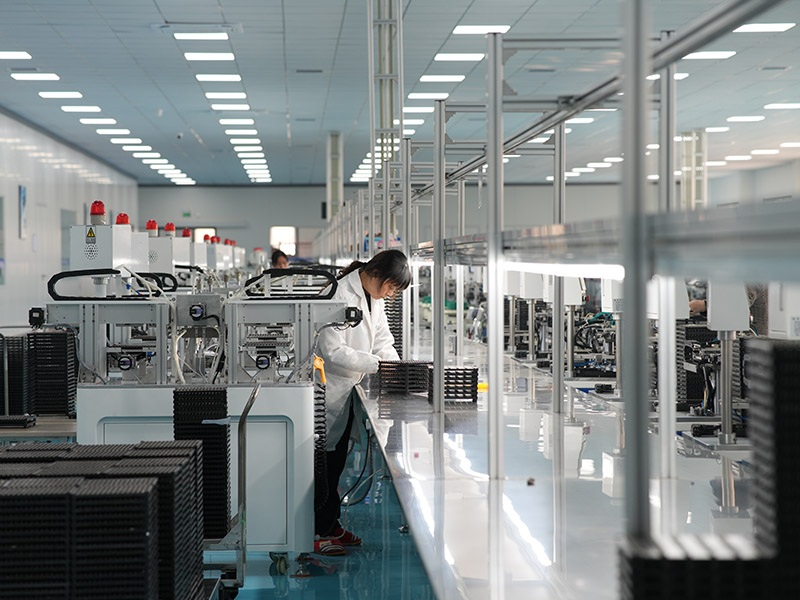 Automated ceramic pressing and electrode screen‑printing line at MEIDI