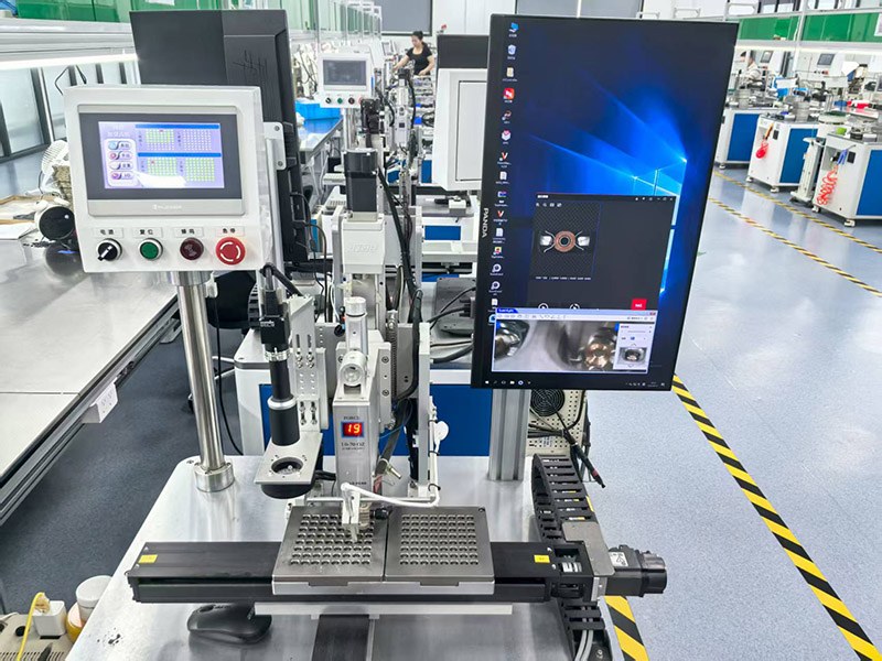Automated buzzer production line with acoustic test stations